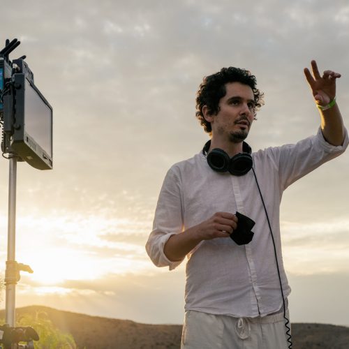 Director Damien Chazelle on the set of Babylon from Paramount Pictures.